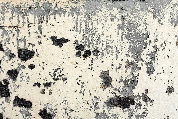 Doku, duvar, beton, arka plan olarak kullanılabilir. Çizik ve çatlaklarla dolu bir duvar parçası.