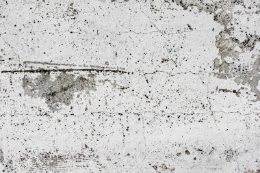 Doku, duvar, beton, arka plan olarak kullanılabilir. Çizik ve çatlaklarla dolu bir duvar parçası.