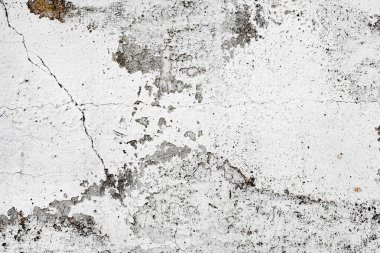 Doku, duvar, beton, arka plan olarak kullanılabilir. Çizik ve çatlaklarla dolu bir duvar parçası.