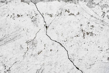 Doku, duvar, beton, arka plan olarak kullanılabilir. Çizik ve çatlaklarla dolu bir duvar parçası.