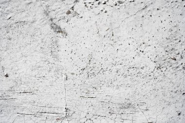 Doku, duvar, beton, arka plan olarak kullanılabilir. Çizik ve çatlaklarla dolu bir duvar parçası.