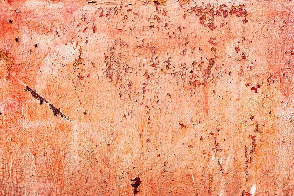 Çatlakları ve çizikleri olan metal bir duvarın dokusu arka plan olarak kullanılabilir.