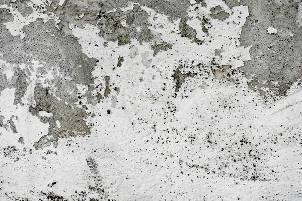 Doku, duvar, beton, arka plan olarak kullanılabilir. Çizik ve çatlaklarla dolu bir duvar parçası.