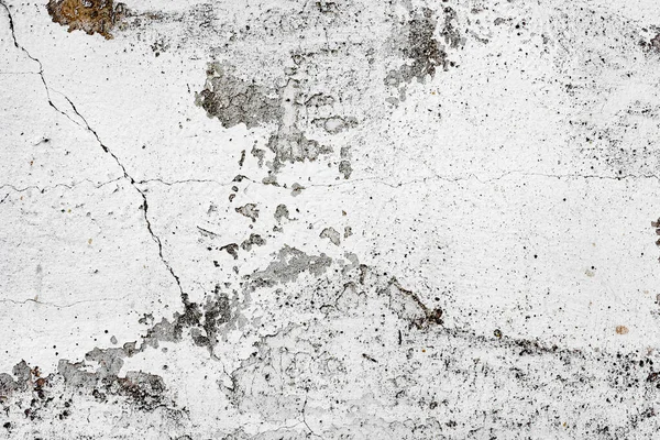 Doku, duvar, beton, arka plan olarak kullanılabilir. Çizik ve çatlaklarla dolu bir duvar parçası.