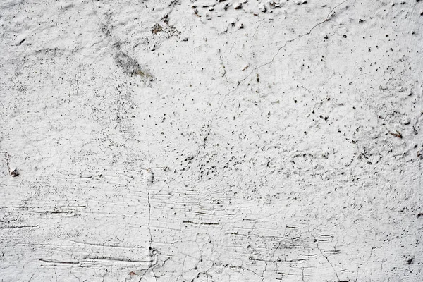Doku, duvar, beton, arka plan olarak kullanılabilir. Çizik ve çatlaklarla dolu bir duvar parçası.