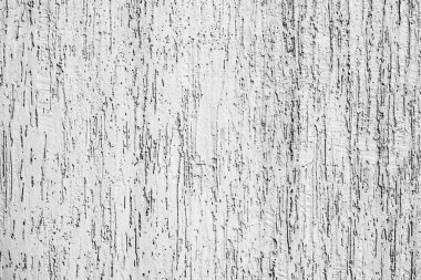 Çatlakları ve çizikleri olan metal bir duvarın dokusu arka plan olarak kullanılabilir.