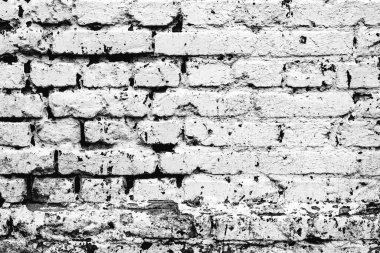 Çatlakları ve çizikleri olan tuğla duvar dokusu arka plan olarak kullanılabilir.