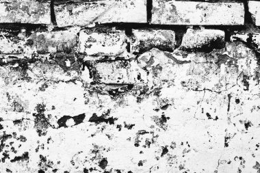Çatlakları ve çizikleri olan tuğla duvar dokusu arka plan olarak kullanılabilir.