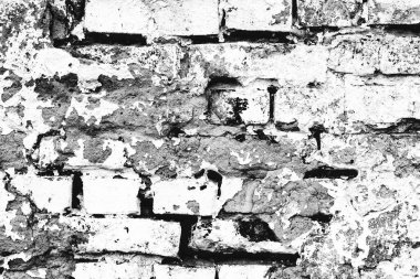 Çatlakları ve çizikleri olan tuğla duvar dokusu arka plan olarak kullanılabilir.