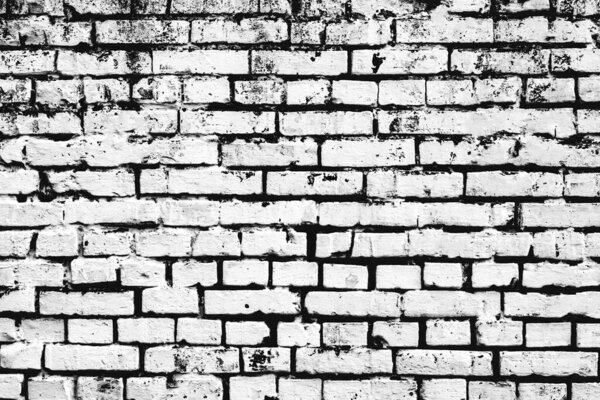 Текстура кирпичной стены с трещинами и царапинами, которые могут быть использованы в качестве фона