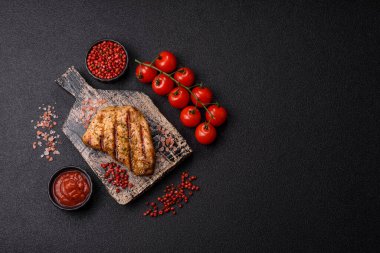 Tavuk göğsü bifteği, ızgara tavuk fileto, sağlıklı yemek, öğle yemeği. Tasarımınız için arka planda tavuk bifteği