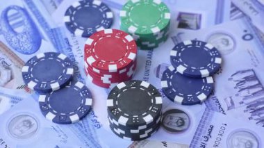 Birleşik Arap Emirlikleri 'nde kumarhane oyunu, kirli para, çip, kart ve diğer özellikler. Emirlikler 'deki kumarhanelerde kumar oynamak senin tasarımının arka planında var.