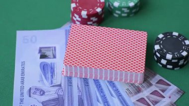 Birleşik Arap Emirlikleri 'nde kumarhane oyunu, kirli para, çip, kart ve diğer özellikler. Emirlikler 'deki kumarhanelerde kumar oynamak senin tasarımının arka planında var.