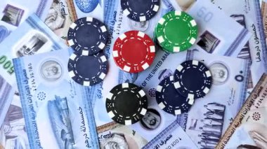 Birleşik Arap Emirlikleri 'nde kumarhane oyunu, kirli para, çip, kart ve diğer özellikler. Emirlikler 'deki kumarhanelerde kumar oynamak senin tasarımının arka planında var.