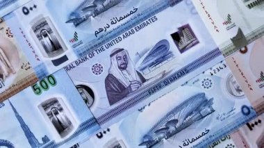 BAE parası, dirhem, finansal ve iş süreçleri için nakit Arap banknotları. Tasarımınız için finansal bir arkaplan olarak Emirlikler