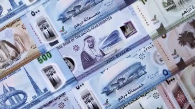 BAE parası, dirhem, finansal ve iş süreçleri için nakit Arap banknotları. Tasarımınız için finansal bir arkaplan olarak Emirlikler