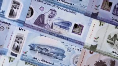 BAE parası, dirhem, finansal ve iş süreçleri için nakit Arap banknotları. Tasarımınız için finansal bir arkaplan olarak Emirlikler