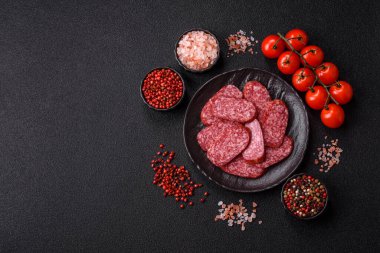 Sliced salami sausage, smoked meat as a delicacy for the table. Salami sausage as a food background for your design.