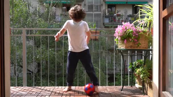 Boy Playing Ball Balcony — Stock Video