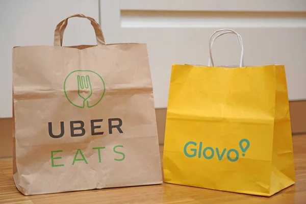 ITALY - Milan october 30,2019 - Uber Eats and Glovo delivery food 