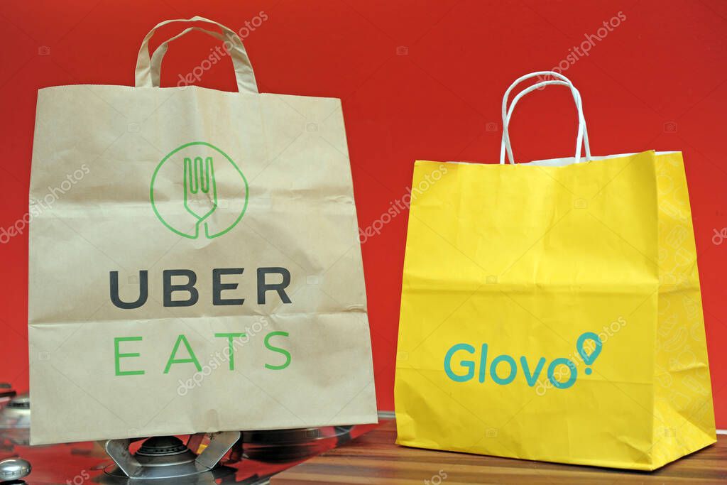 ITALY - Milan october 30,2019 - Uber Eats and Glovo delivery food - order food from the restaurant and eat at home