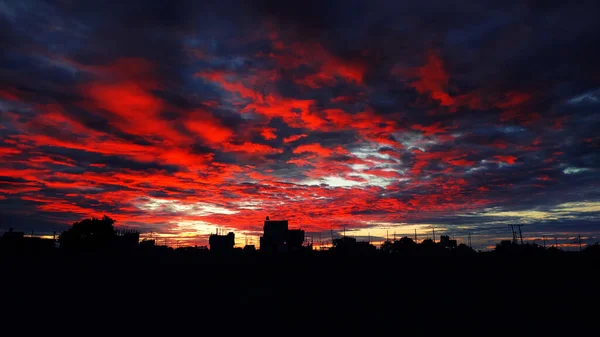 Silhouette Image Red Sky Dark Buildings Clouds — Stock Photo, Image