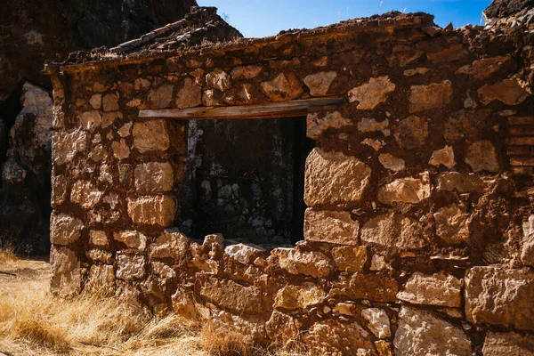 ruined house in an old mine