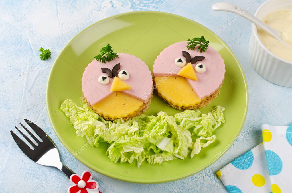 Sandwiches with sausage and cheese Angry birds. Funny food for kids'