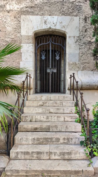 Stairs and entrance door to the Quart towers in Valencia