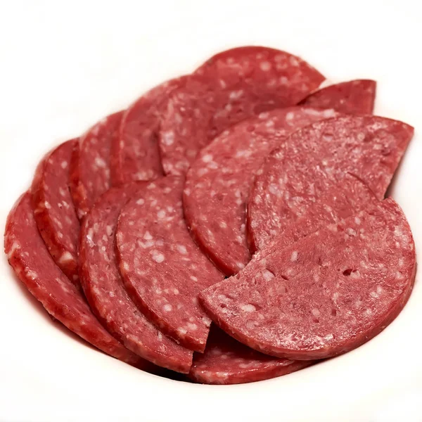 Колбаса салями ломтики мяса на белом фоне квадратный ингредиент — стоковое фото