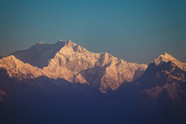 Mount Kanchenjunga en yüksek dağ, yükseklik, Nepal ve Hint devlet Sikkim sınırında dünyanın üçüncü kirişler Sunrise - karda ile.
