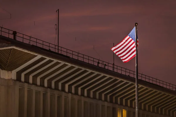 US flag flutters in front of the building US Embassy in Sri Lank