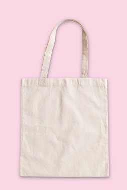 Çanta kumaş kumaş alışveriş çuvalı modeli pembe arkaplanda izole edildi (kırpma yolu))