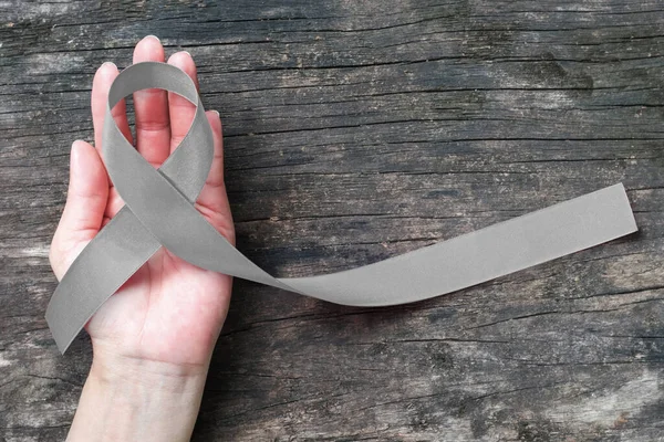 Brain Cancer Awareness Grey Ribbon Helping Hand Isolated Clipping Path — Stock Photo, Image