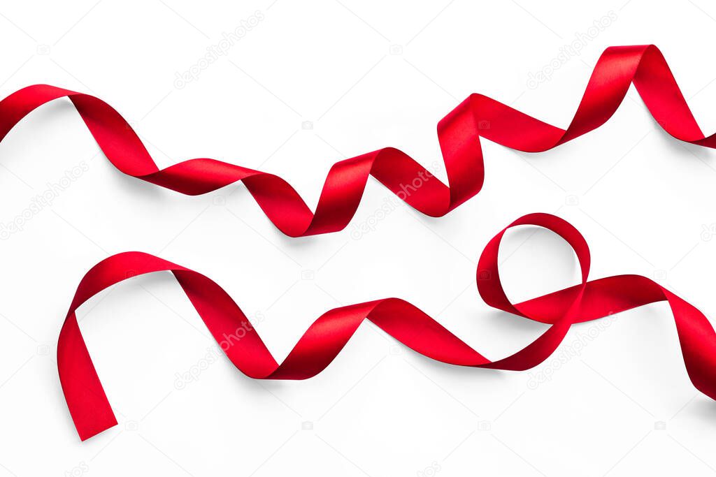 Red bow ribbon satin texture isolated on white background with clipping path