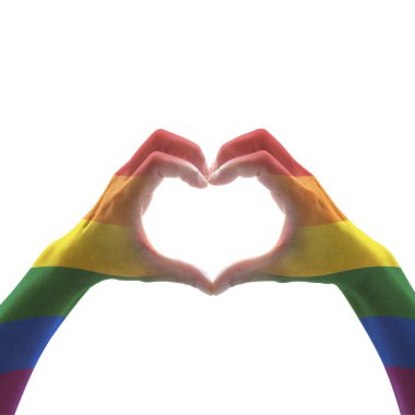 Gökkuşağı rengi bayrak deseni, mavi renkli arka planda kalp şeklinde şekillenen kadın eli: LGBT toplumunun aşk ve evlilik sosyal eşitliğinde eşit haklar / insanlar kavrayışında