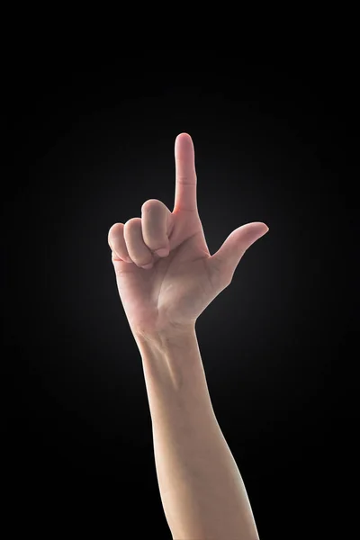 Рука Жінки Вказівним Пальцем Фланцевим Світлом Ізольовано Чорному Тлі Відсічний — стокове фото