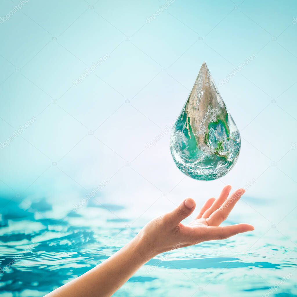 World ocean day,, saving water campaign, sustainable ecological ecosystems concept with green earth on woman's hands on blue sea background : Element of this image furnished by NASA