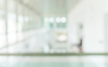 Ofis binası arka plan bulanık iş lobisi resepsiyon salonu iç mekan ya da pencere camından gelen bulanık ışığı olan boş oturma odası