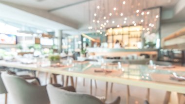 Lokanta yemek masası geçmişi bulanık lüks otel yemekleri ve içecek F & B tesisi kahve dükkanı ve kafeterya servisi için bulanık bar gişesi.