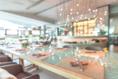 Lokanta yemek masası geçmişi bulanık lüks otel yemekleri ve içecek F & B tesisi kahve dükkanı ve kafeterya servisi için bulanık bar gişesi.