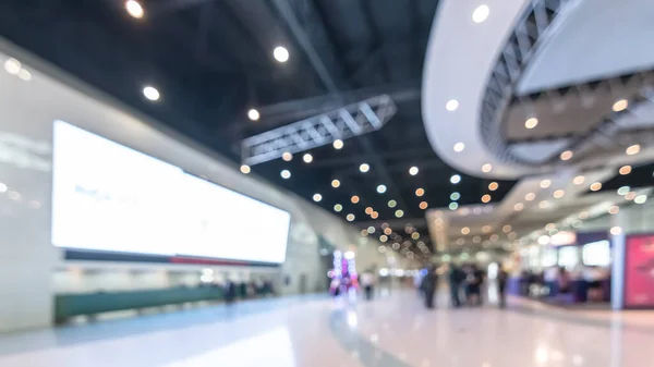 Exhibition event convention hall business blur background of tech expo, trade fair, passenger terminal or museum gallery lobby with blurry interior large corridor hallway white room empty space