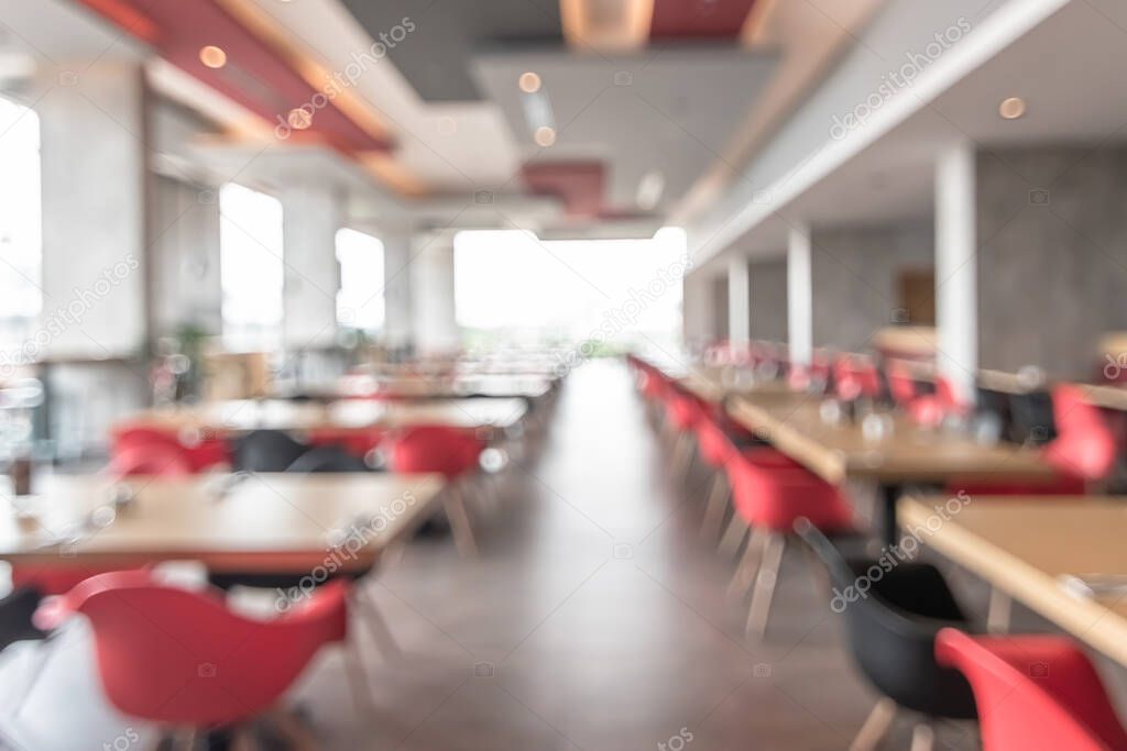 Canteen, cafeteria, hotel restaurant blur background with blurry dining table and chair in school or university food facility interior empty hall  