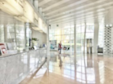 İş yerinin lobisi bulanık banka resepsiyon salonu müşterisi ya da hasta sayaç servisi ve bulanık hastane, ofis ya da cam pencereli otel bekleme salonu içindeki kasiyer masasının geçmişi