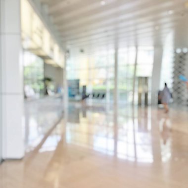 İş yerinin lobisi bulanık banka resepsiyon salonu müşterisi ya da hasta sayaç servisi ve bulanık hastane, ofis ya da cam pencereli otel bekleme salonu içindeki kasiyer masasının geçmişi