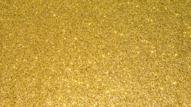 Altın parıltılı arka plan, Noel tatili için parlak ambalaj kağıdı. Duvar kağıdı dekorasyonu, selamlama ve düğün davetiyesi tasarımı unsuru.