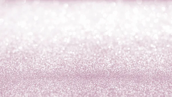 Rose gold pink blur glitter bokeh background with blurry silver white sparkling light of metallic texture shimmering backdrop for holiday decoration