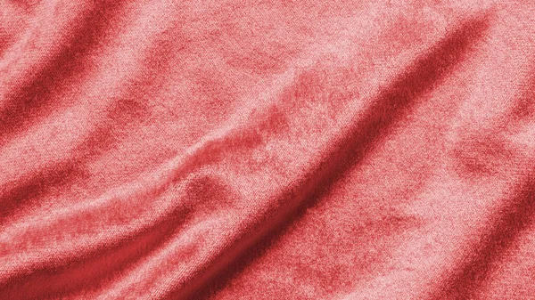 Red velvet background or velour flannel texture made of cotton or wool with soft fluffy velvety satin fabric cloth rose gold metallic color material
