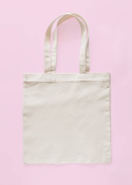 Çanta çantası kumaş kumaş kumaş kumaş eko alışveriş çuvalı boş şablon izole Pastel pembe arkaplan (kırpma yolu)