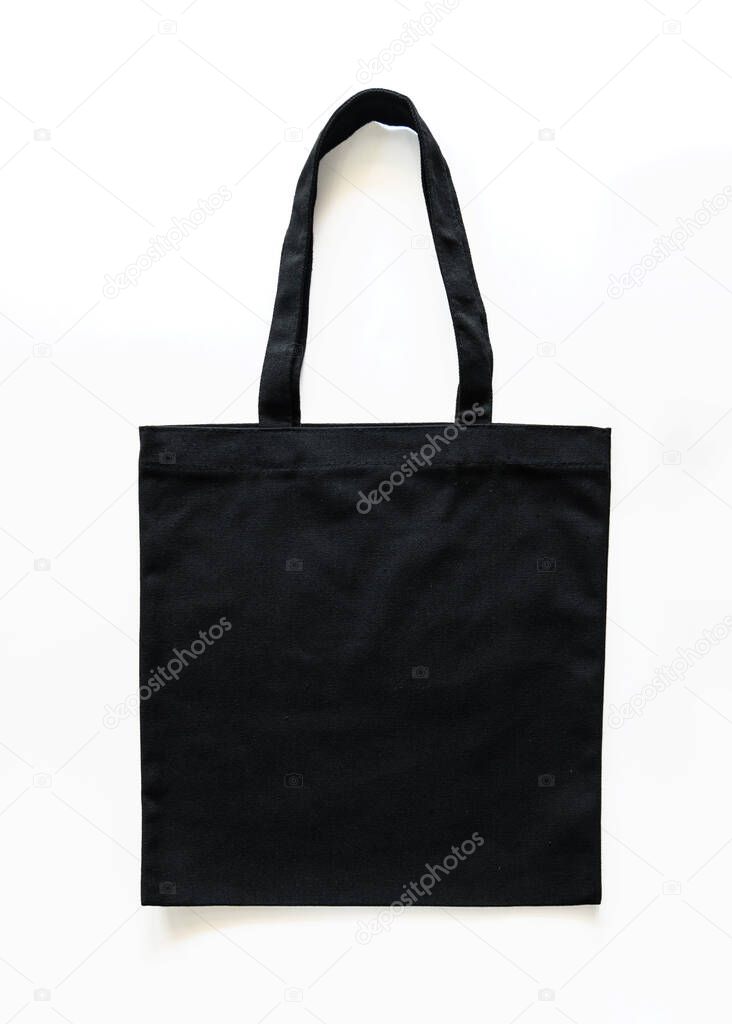 Black canvas tote bag mockup fabric cloth texture for woman's shoulder eco shopping sack mock up template isolated on white background (clipping path)